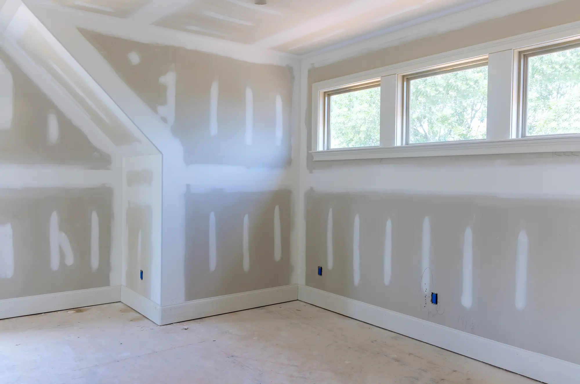 Room with drywall taped and finished, ready for paint