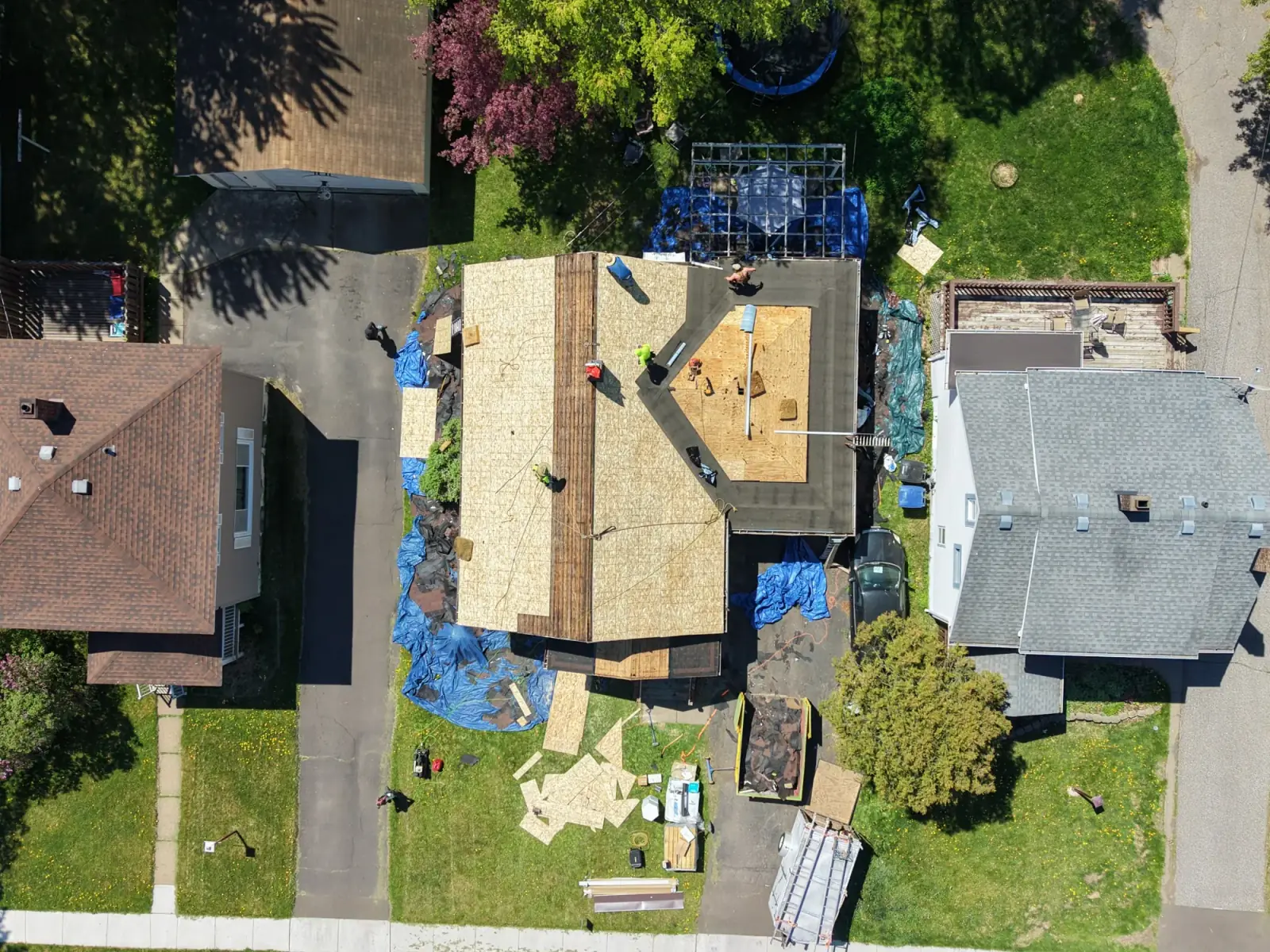 Roof sheathing being replaced on an Esko home
