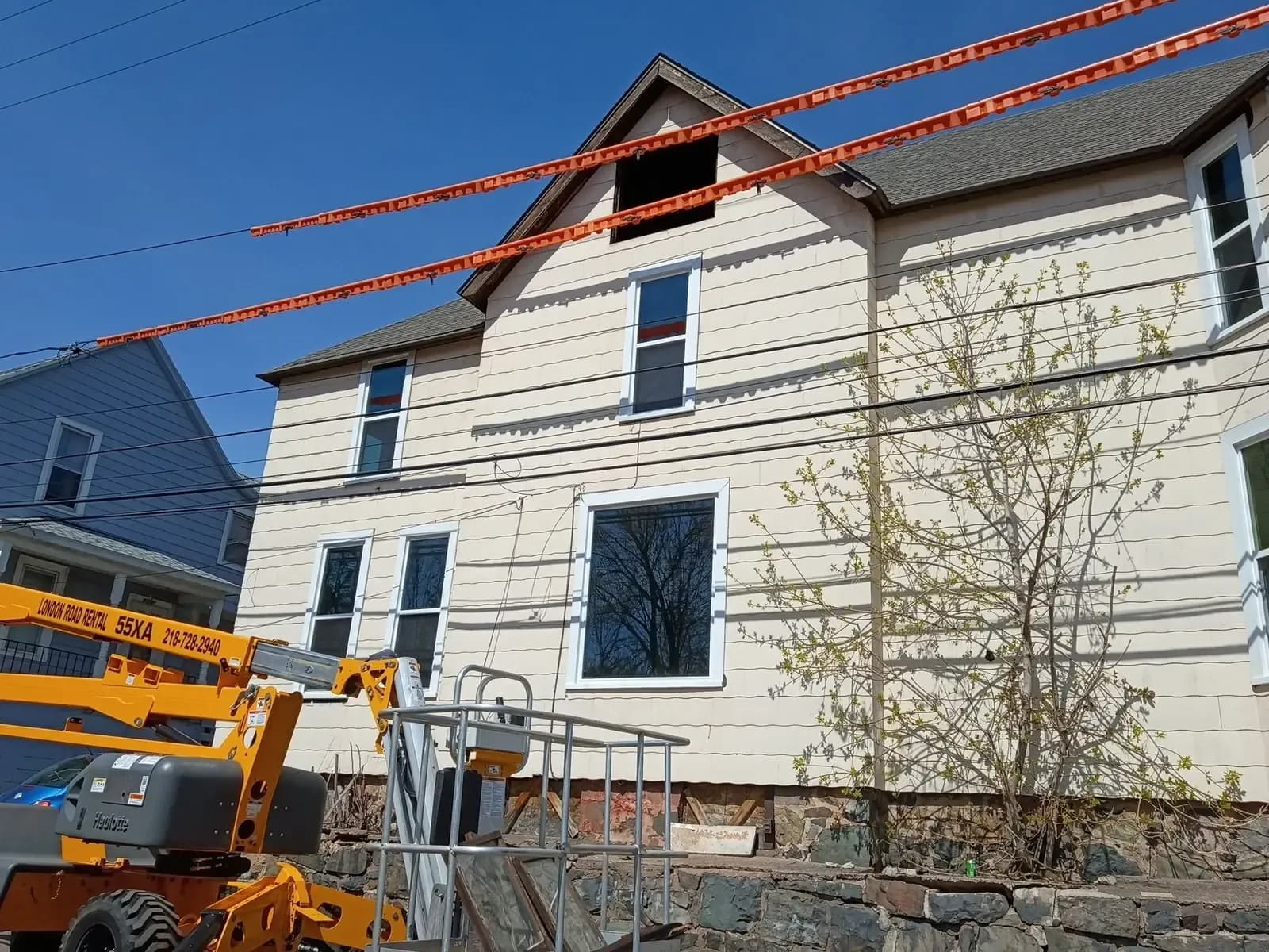 Gable window opening framed out on a home, lift in position for the work